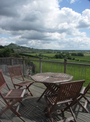 the deck at Healing Waters with a view of the Tor