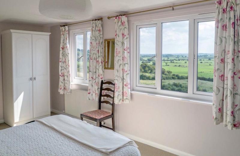 Peaceful bedroom at Healing Waters Sanctuary in Glastonbury
